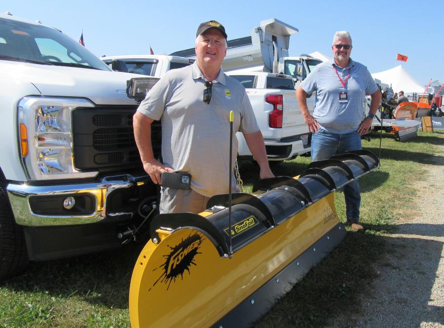 Fisher Engineering’s Norm Klimko (L) was joined by David Fricke of Tommy Gate to discuss upfitting and winter maintenance equipment at the KE Rose Company equipment display.
(CEG photo)