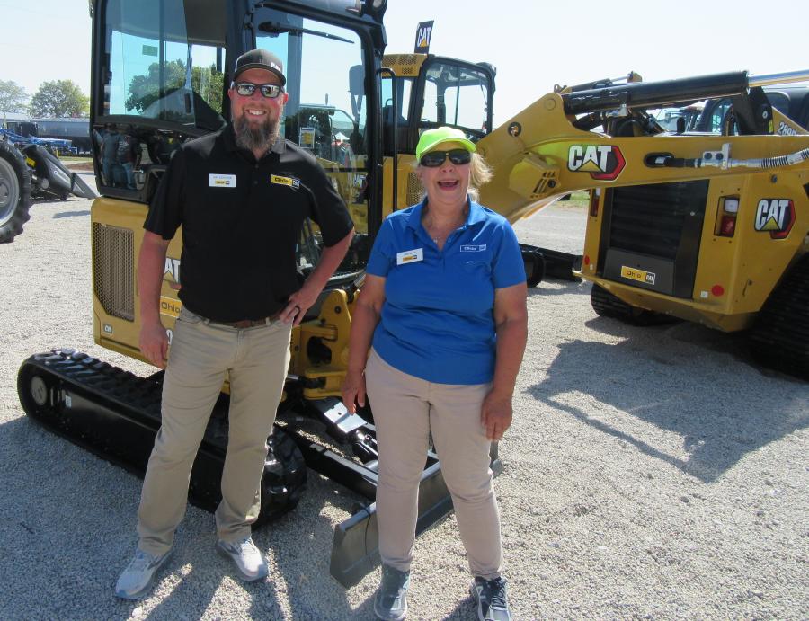 Ohio CAT’s Jeff Schuster (L) and Linda Meier had plenty of Caterpillar equipment to review with attendees.
(CEG photo)