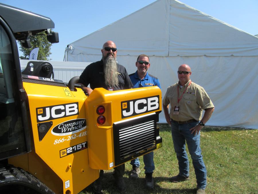 Among the equipment on display at the Company Wrench booth was this JCB 215T compact track loader presented by (L-R) Gabe Clark, Matt Green and Clay Durham. 
(CEG photo)