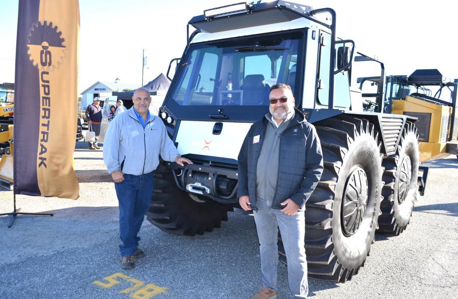 The new Fat Truck 2.8P, a completely amphibious pickup truck, was showcased at the Supertrak display. Dave Evans (L) of Supertrak, Punta Gorda, Fla., a Southeast dealer, and Amine Khimjee, vice president of sales and marketing of Fat Truck, Cowansville, Quebec, Canada, had lots of interested attendees ask about this vehicle. 
(CEG photo)