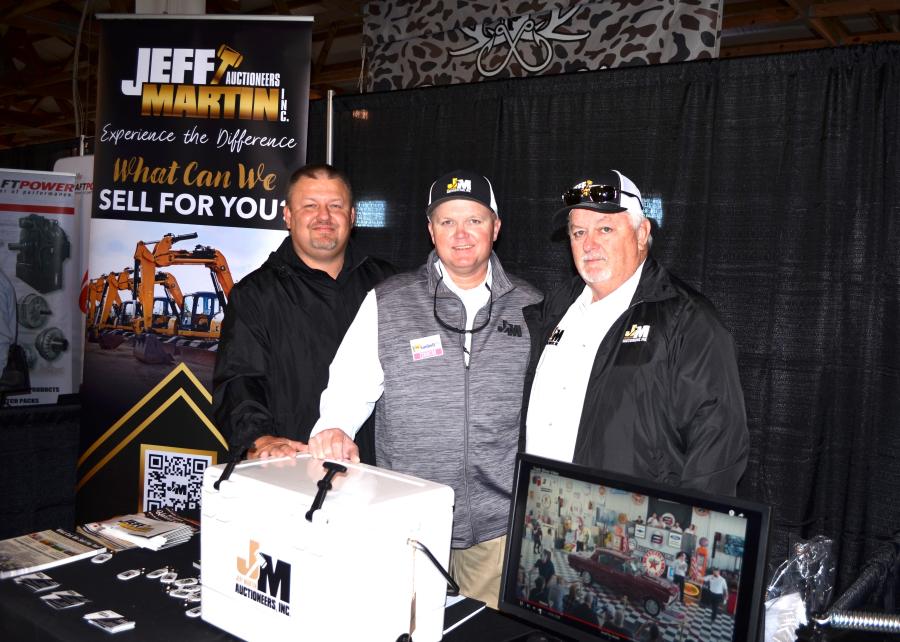 (L-R): Jimmy Staton, Steven Mathis and Steve Ryals of Jeff Martin Auctioneers were busy promoting their farm and construction equipment auctioning services. 
(CEG photo)