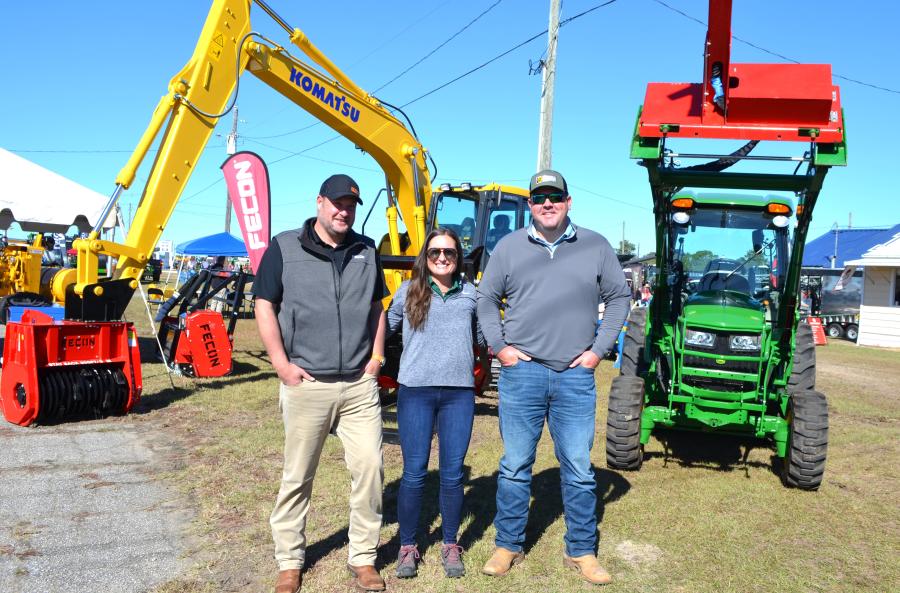 (L-R): Regular annual exhibitors at the show, Blake Eavenson and Amelia Reynolds of Fecon, and the manufacturer’s local dealer representative, Jon Donnelly, Tractor & Equipment Co., Albany, Ga., had a unique mix of vegetation management mulchers and trimmers to show the attendees. 
(CEG photo)