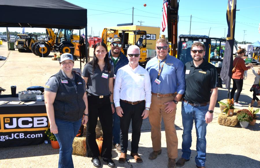 Combining the JCB ag and construction machines with a mobile lounge and many drawings and giveaways, the Briggs JCB booth was non-stop activity for three-days with lots of representatives turning out, including (L-R) Haley Throne of JCB and Alyssa Montero, Darius Prentice, John Hilberling, Chris Pendleton and Cory Lord of Briggs JCB.  
(CEG photo)