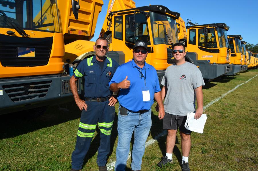 (L-R): James Stennett, Eddie Milam and Caleb Milam of Milam Equipment, Leland, N.C., were pleased with the machine lineup.  
(CEG photo)