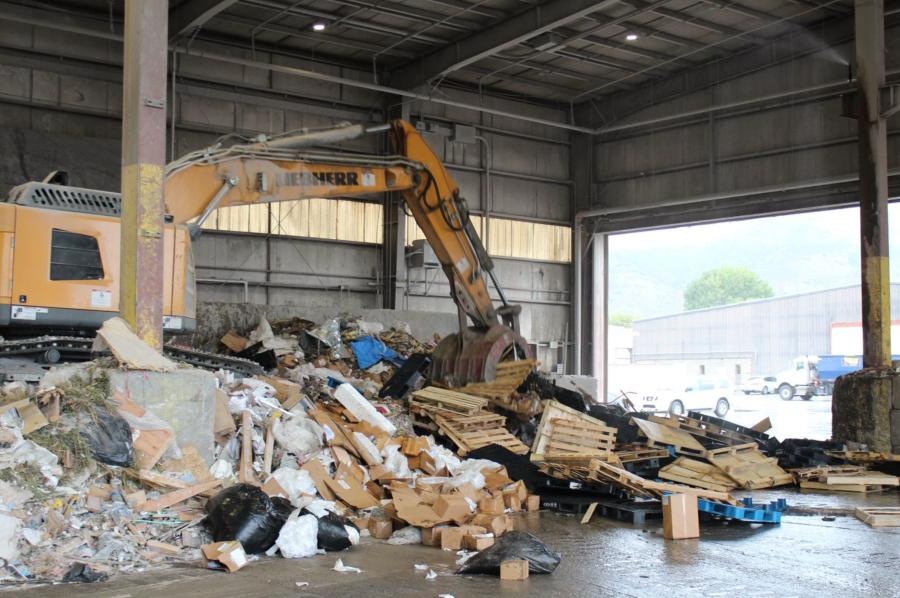 The Liebherr excavator and NYE grapple as a team dramatically increased the efficiency of Ace Intermountain Recycling Center.
(Ace Disposal photo)