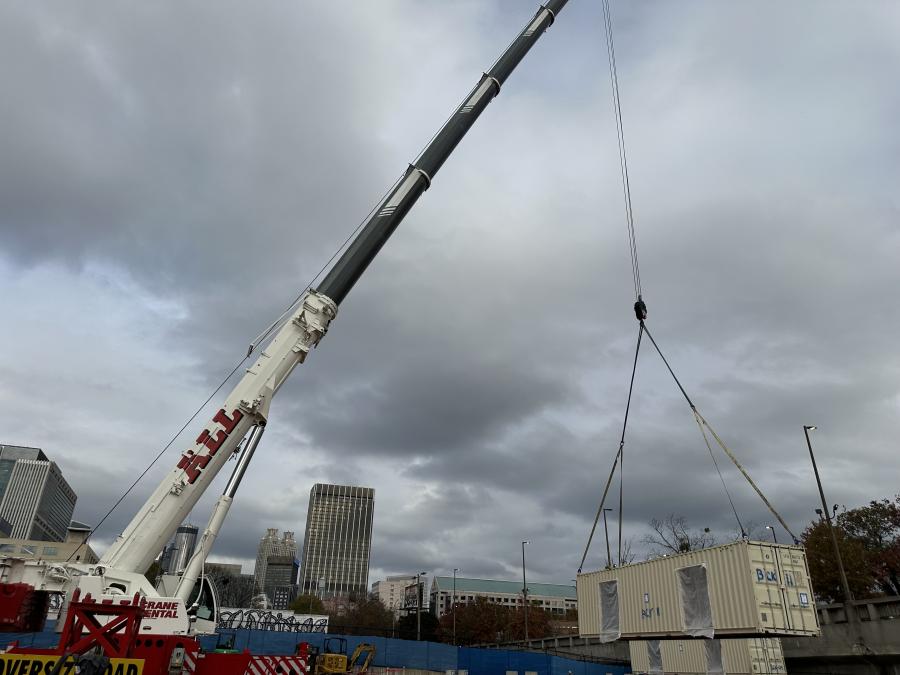 At the destination location downtown, the operator of the Liebherr LTM 1250-5.1 was tasked with carefully lowering each container onto preset foundation piers.