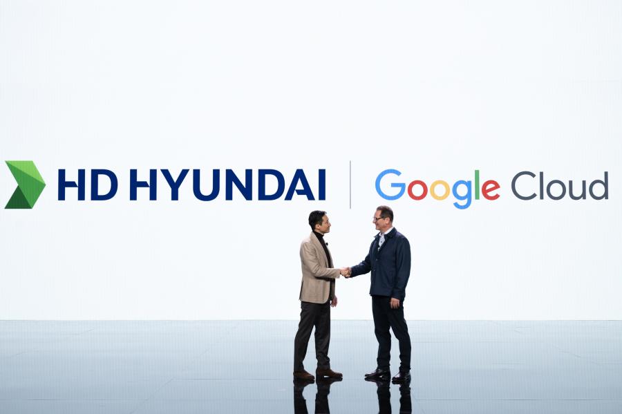 HD Hyundai Vice Chairman Ki-sun Chung (L) shakes hands with Philip Moyer, Google Cloud AI Business Global Vice President, who was also a guest speaker on the keynote at CES 2024.