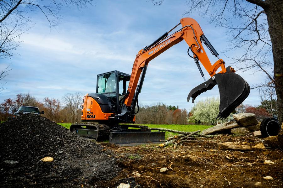 ZAXIS-5N compact excavators are commonly used as tool carriers with a wide range of attachments, increasing job-site versatility. Several features enhance attachment compatibility, including an auxiliary flow rate changer.