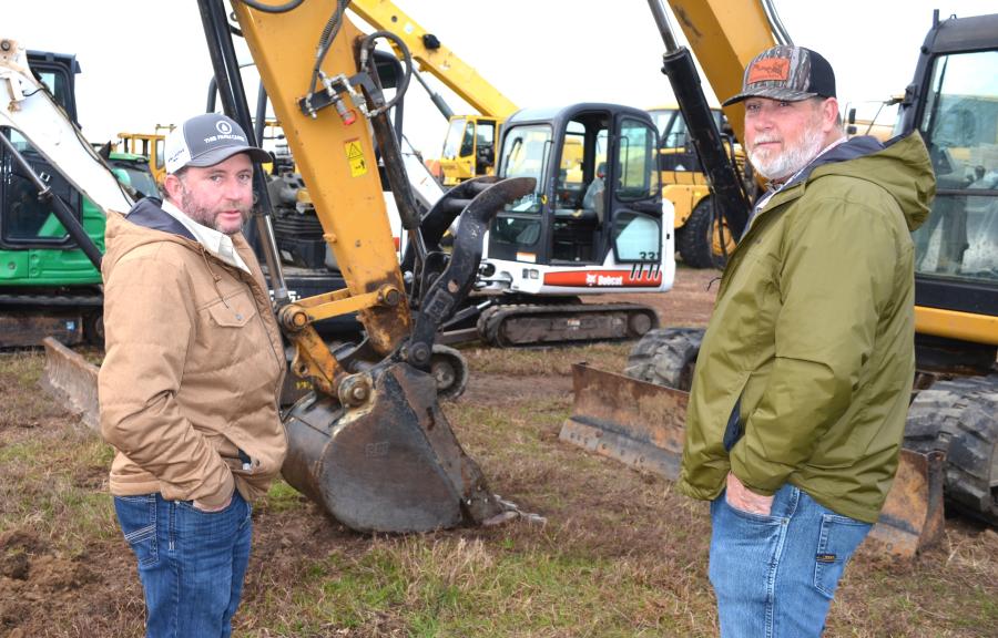 Farmers out looking for bargains on mini-excavators included Miles Langford (L) of Miles Langford Farms, Trenton, Fla., and Ryan Anderson of Ryan Anderson Farms, Chiefland, Fla.  
 (CEG photo)