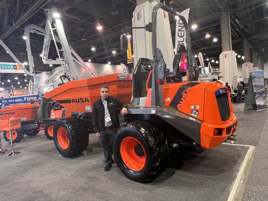AUSA’s Ignasi Moner stands with his company’s D601AHG articulated dumper at World of Concrete 2024. The technologically advanced D601 features the ECO Mode system, which contributes to the machine being both efficient and environmentally friendly. (CEG photo)