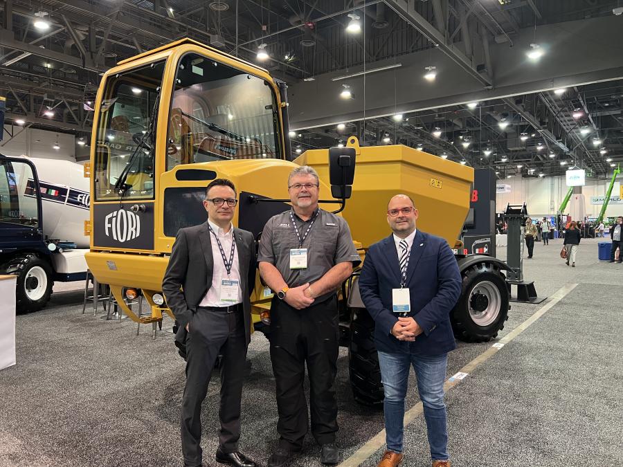 Fiori America continued the roll-out of its dumpers and concrete mixers to the American market at World of Concrete. (L-R) are Mauro Pelliciari, Fiori CEO; Neville Payner, executive vice president of Bell Trucks America; and Antonio Gallovich, Fiori export area manager.  Bell Trucks America is Fiori’s master distributor for the United States. (CEG photo)