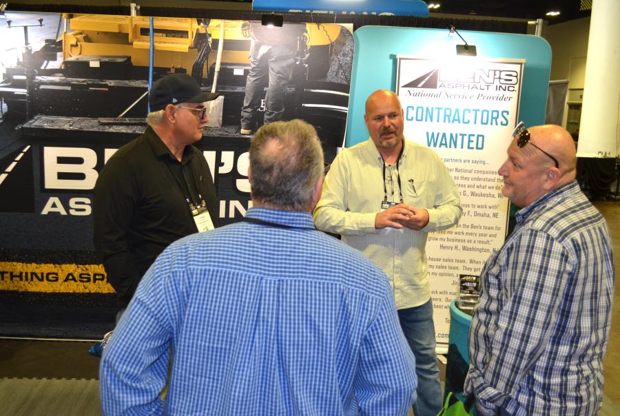Promoting “Contractors Wanted” for its national services was the unique campaign at Ben’s Asphalt’s display. Ed Howard (L) and Erik Benson (C), both of Ben’s Asphalt. (CEG photo)