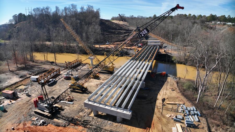 The extension of McWright's Ferry Road, which got under way last July, will connect Rice Mine Road to the new Watermelon Road, creating a bridge across the North River.