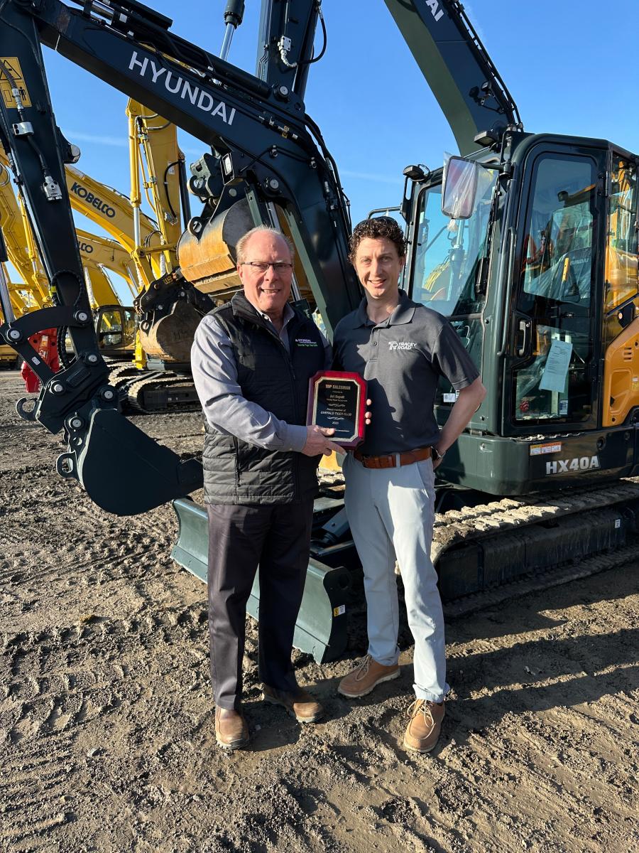Art Ospelt (L) and Jesse Weller, equipment manager, both of Tracey Road Equipment. Ospelt recently earned the Hyundai Emerald Tiger Club Award for being among the Top 20 Hyundai sales representatives in the United States.