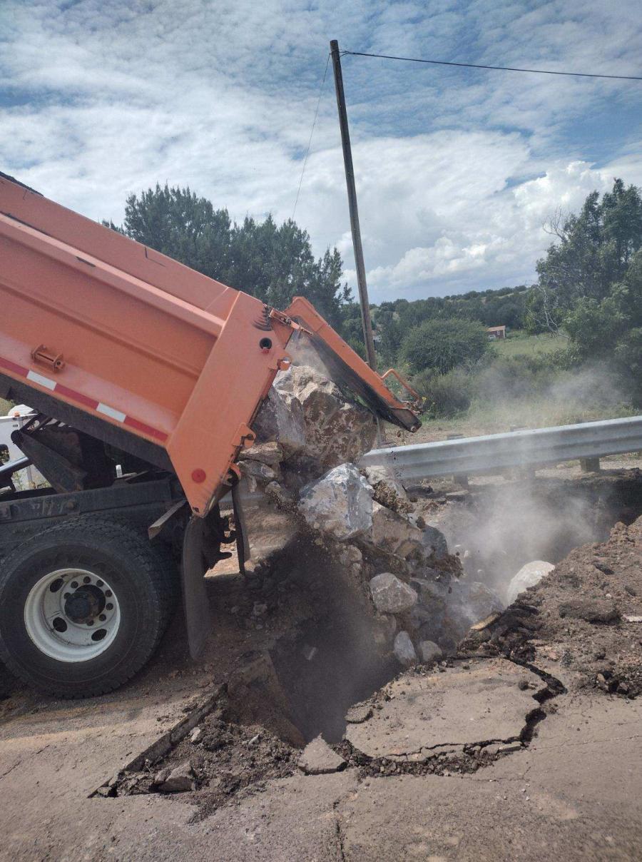 Workers with the New Mexico Department of Transportation successfully backfilled both washed-out approaches to the Greenwood Canyon bridge on U.S. 180.